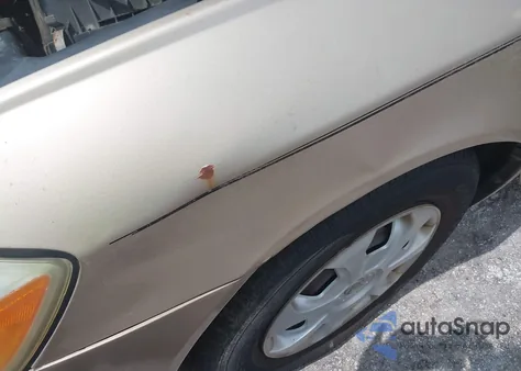 2002 Toyota Avalon Xl z USA, uszkodzony, nr VIN 4T1BF28B32U211712